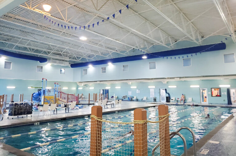 An indoor aquatics center with lanes pool.
