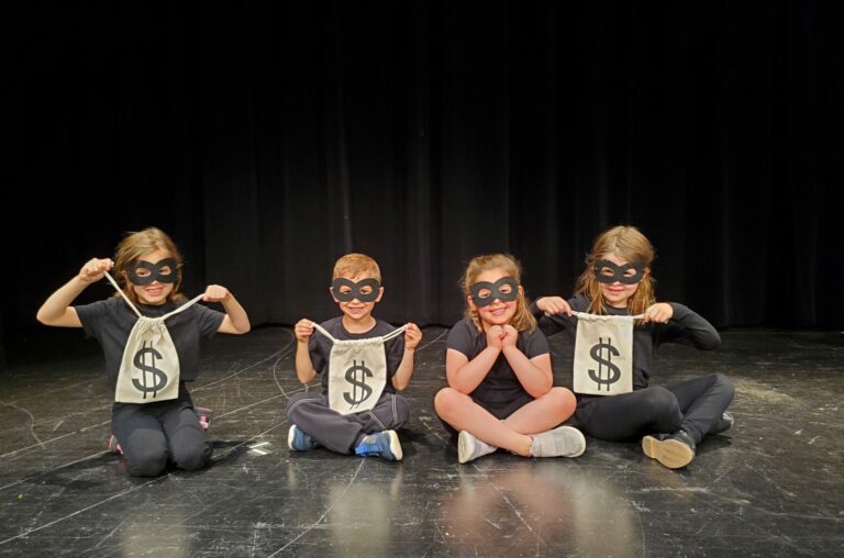 Kids dressed as robbers for a play