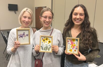 People posing with their pressed flowers art