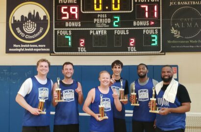 Men's Basketball Team Winners Smiling