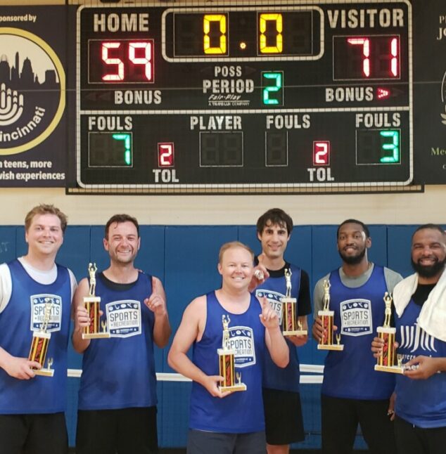 Men's Basketball Team Winners Smiling
