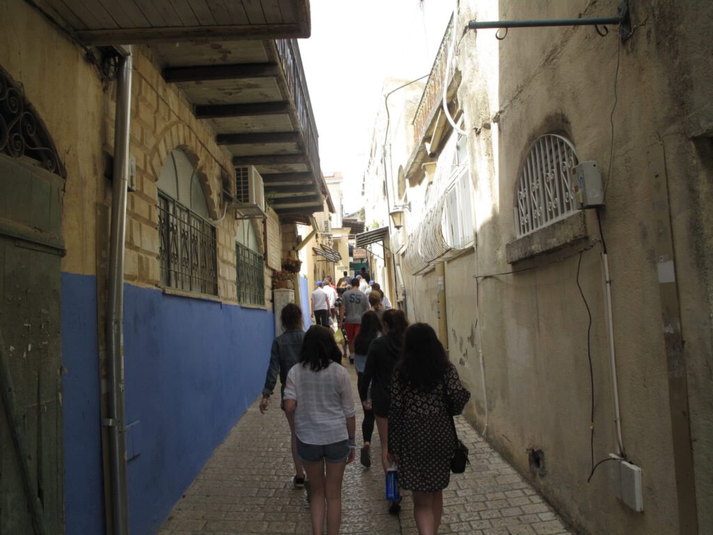 People walking through a street