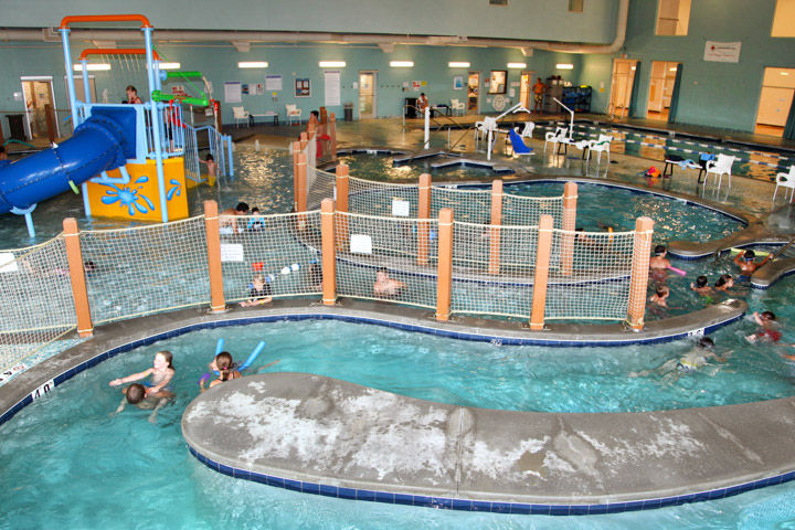 Kids enjoy an indoor water park