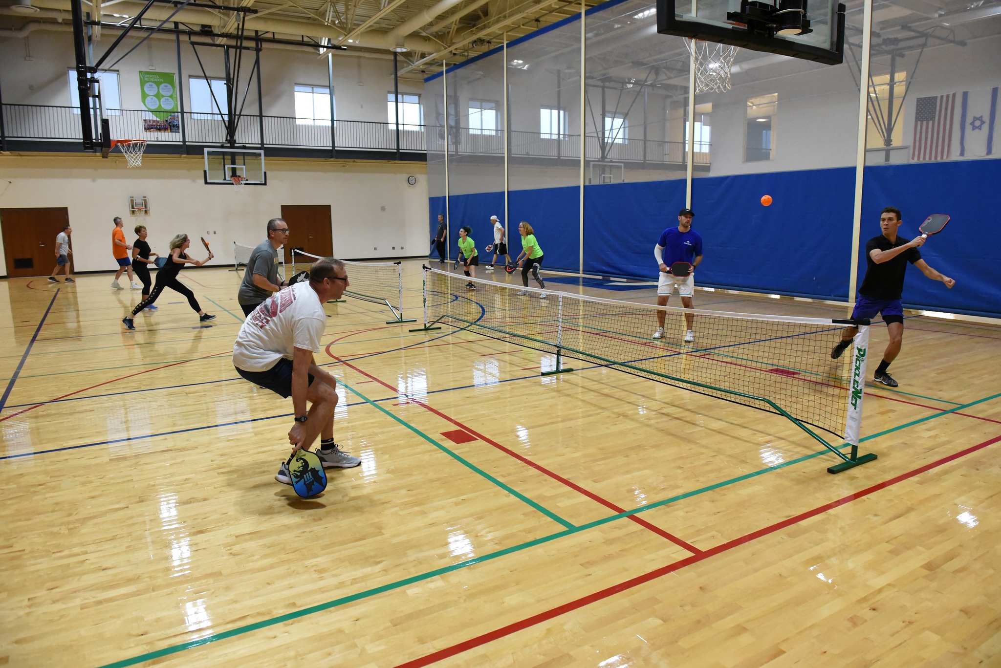 People playing pickleball