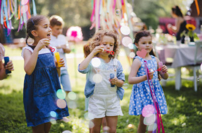 Kids blowing bubbles