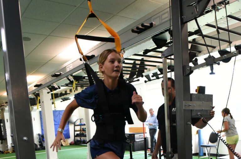 Girl running on treadmill