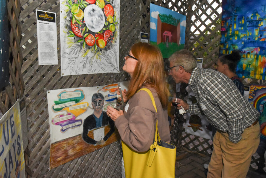 People admiring art