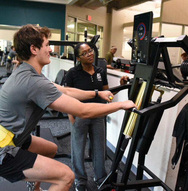 Person working out with a trainer