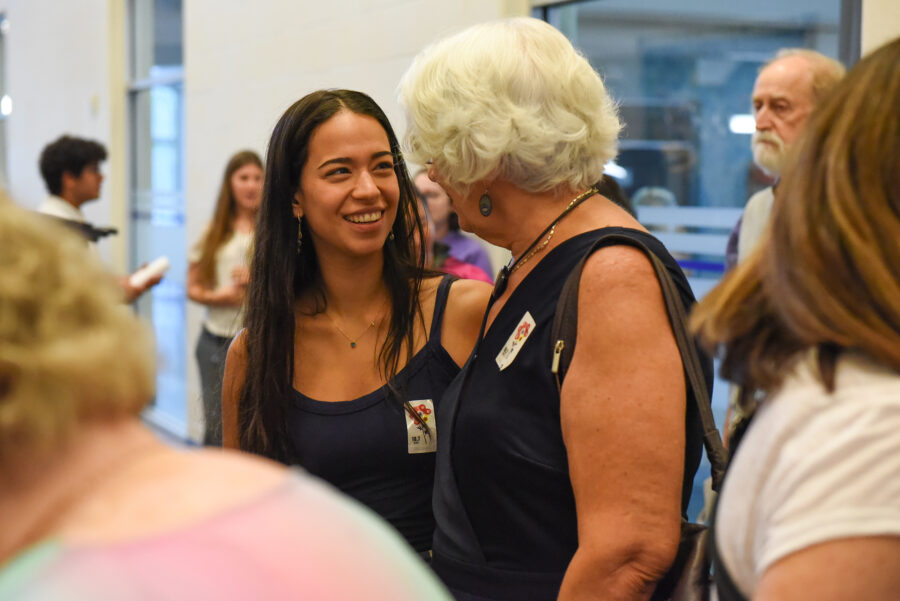 People talking to each other at an event