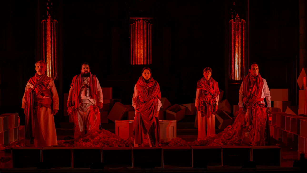 People standing together with a red hue over them