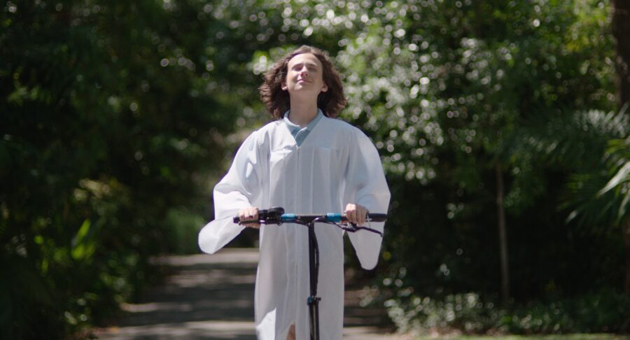 Kid riding on a scooter