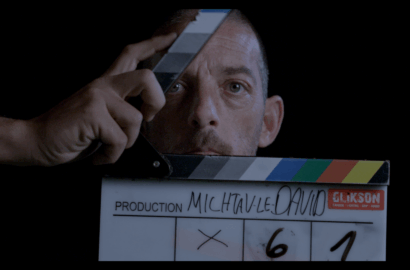 Man with a movie clapboard