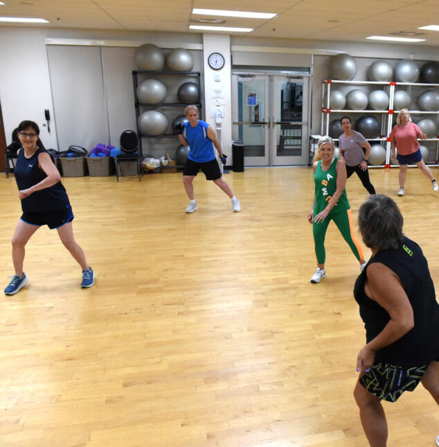 People doing a Zumba class